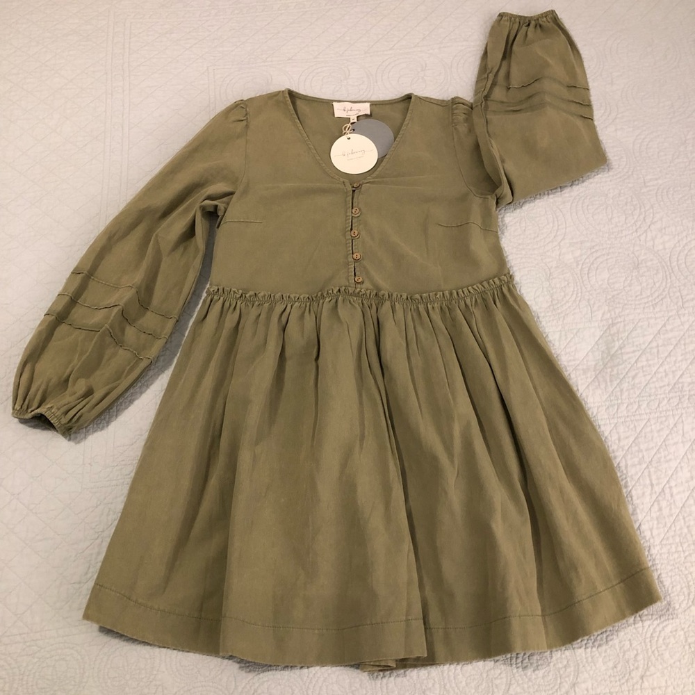 In February Farrah babydoll peasant dress. Size medium. NWT